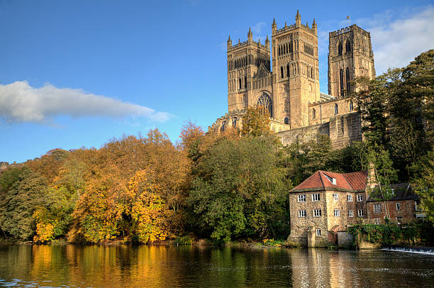 Durham Cathedral and the Old Fulling Mill Durham Cathedral and the Old Fulling Mill, in bright autumn sunshine on the River Wear river wear stock pictures, royalty-free photos & images