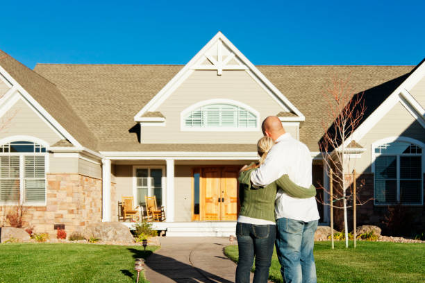 istock Young Couple Admiring Their New Home 155136246