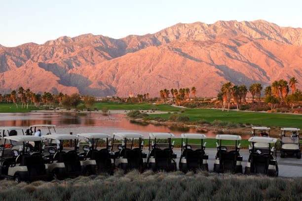 istock Desert Golf Course With Carts At Sunrise 155137001