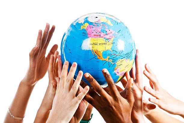 istock Human greed on a global scale; hands grabbing the world 155137502