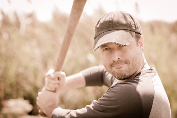 istock Vintage Baseball Player in Batting Stance, With Outdoor Setting 155137665