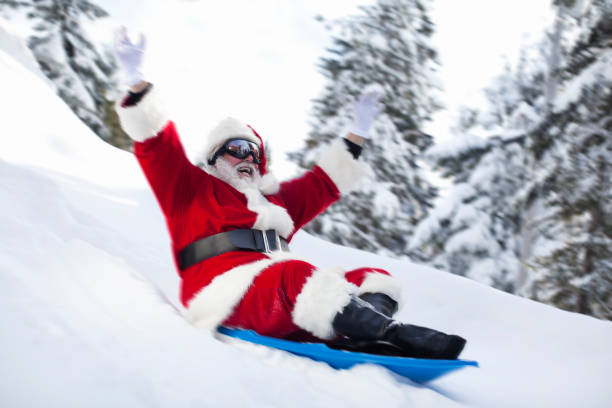 istock Cheerful Santa Claus Sledding on Snowy Hill, Copy Space 155137754