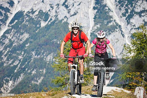 Couple On Mountain Bikes Stock Photo - Download Image Now - 20-24 Years, 25-29 Years, Activity