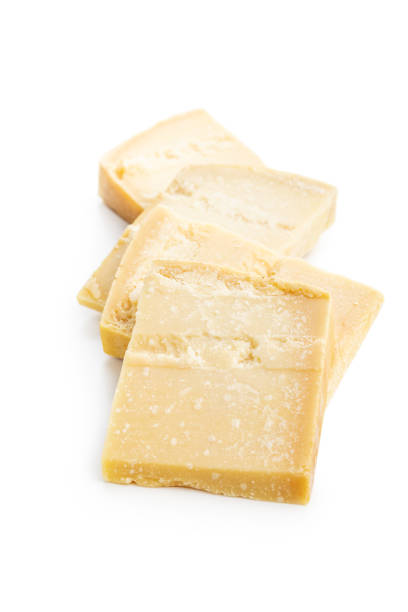 istock Tasty parmesan cheese isolated on white background. 1551382687