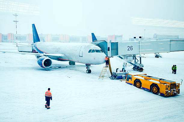 istock Airplane de-iced after snowstorm 155138402