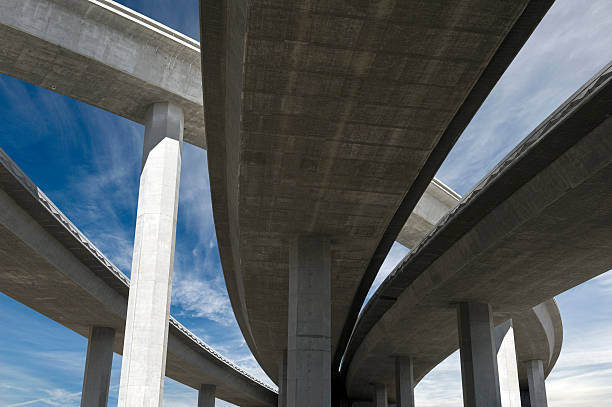 freeway span - construction bridge below concrete foto e immagini stock