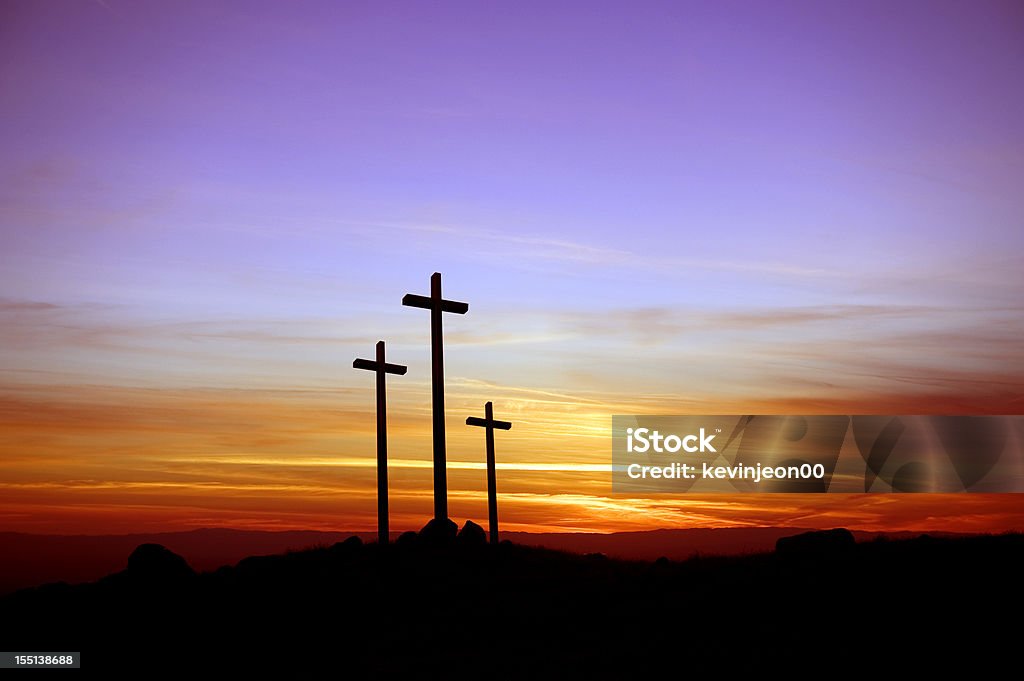 Three crosses standing at the sunset Three Crosses and Dramatic Sky Good Friday Stock Photo