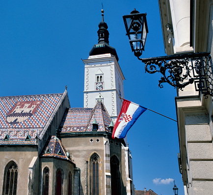 St. Mark's Church and the Croatian national flag at the Parliament Palace in Upper Town, Zagreb