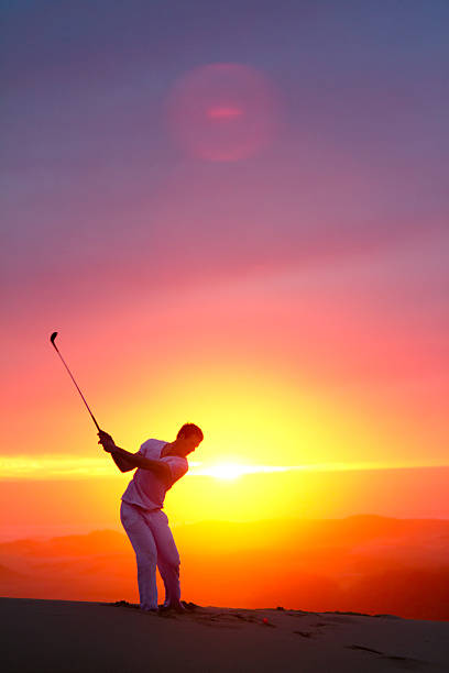 istock Golfer on a hill overlooking the pacific ocean in California 155139514
