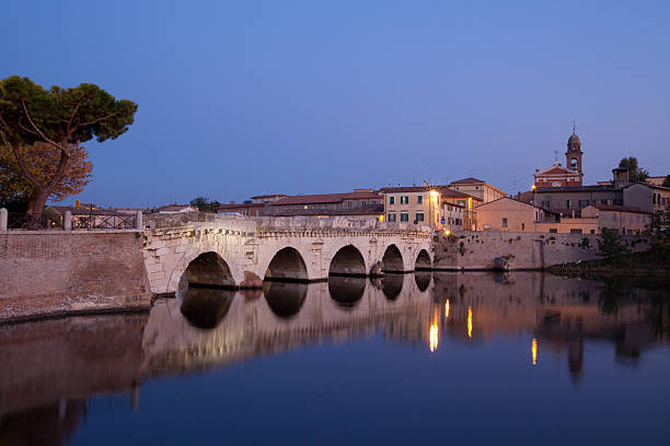 istock Townscape of Rimini with Tiberius bridge at dusk 155139549