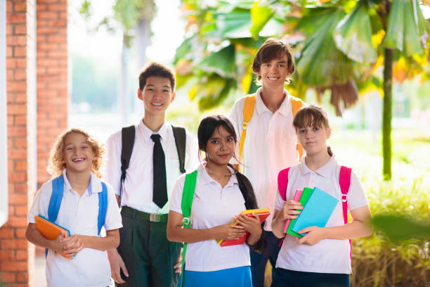 istock Kids back to school. Group of children. 1551398079