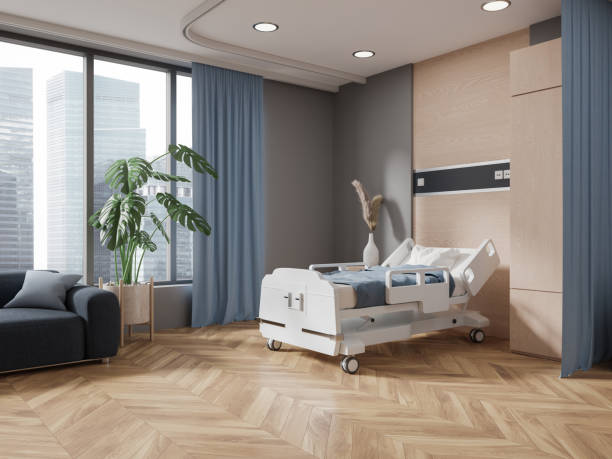 istock Stylish hospital room interior with bed, couch and panoramic window 1551399168