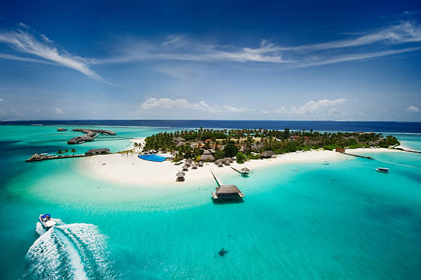 Island of Maldives Beautiful tropical island of Maldives from the air. maldives stock pictures, royalty-free photos & images