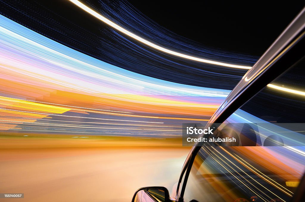 Speed in urban scene The car in night motion blur. Blurred Motion Stock Photo