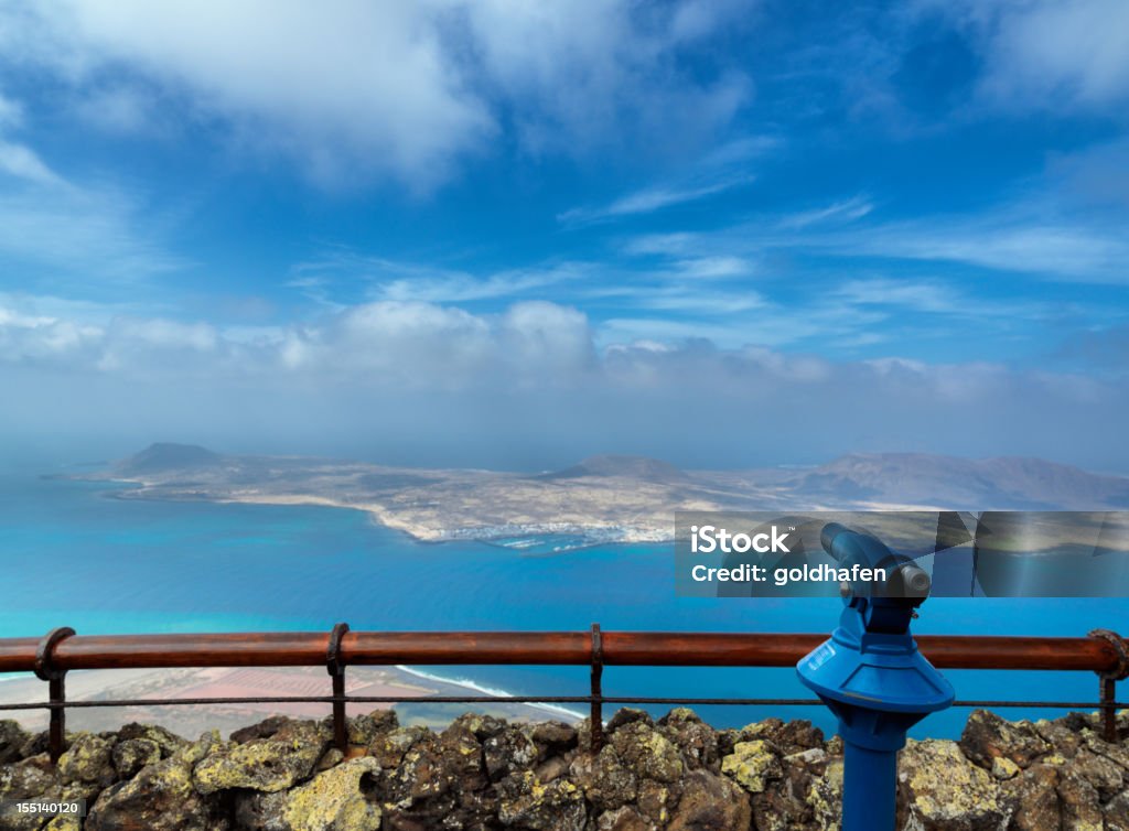 the viewpoint of the river, lanzarote. viewpoint looking at the funny the viewpoint of the river - the Atlantic Ocean and the Chinijo archipelago - La Graciosa, Alegranza, Montaña Clara, Roque del Este, Roque del Oeste and Roque del Infierno - a marine reserve area. Aerial View Stock Photo