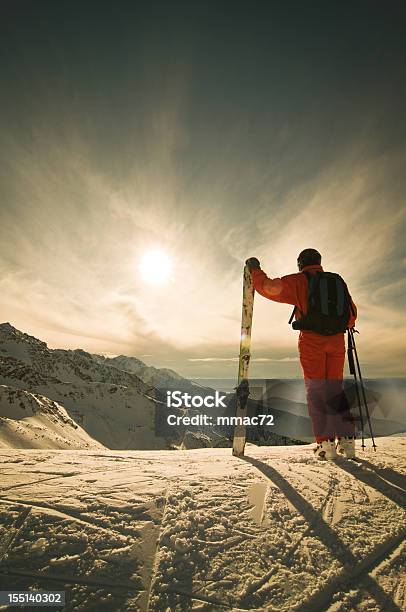 Skier Against Spectacular Mountainscape Stock Photo - Download Image Now - 20-24 Years, 25-29 Years, 30-34 Years