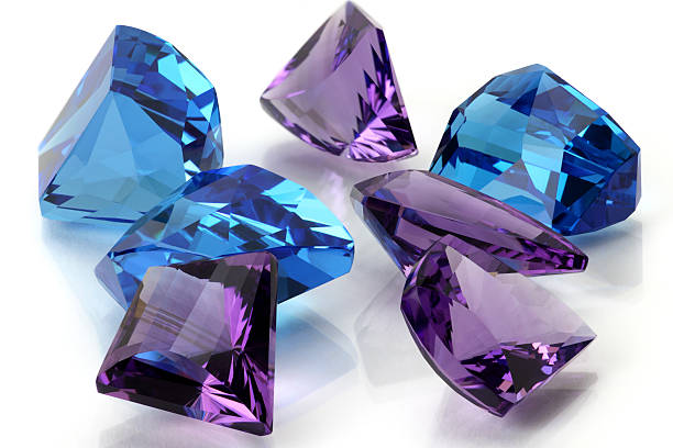 Group of Amethyst & Topaz or Aquamarine in Free From.