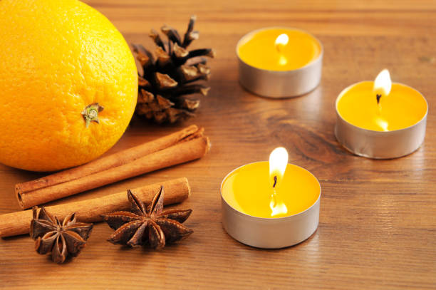 istock yellow tea light and natural Christmas decoration 155140488