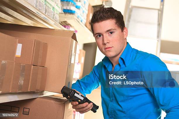 Medical Store Stocking Stock Photo - Download Image Now - Adult, Adults Only, Blue-collar Worker