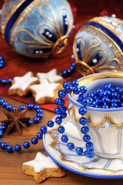 istock Biedermeier porcelain cup with old Christmas ornaments cookies 155140761
