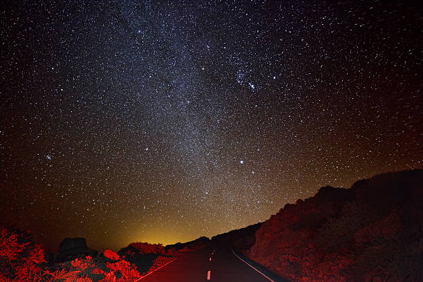 el teide volano in tenerife viewed above the clouds at night