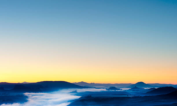 saxon switzerland mist over elbe river at dawn, saxon switzerland elbsandsteingebirge, germany elbe valley stock pictures, royalty-free photos & images