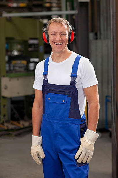 istock smiling craftsman in factory work room, closer 155141324