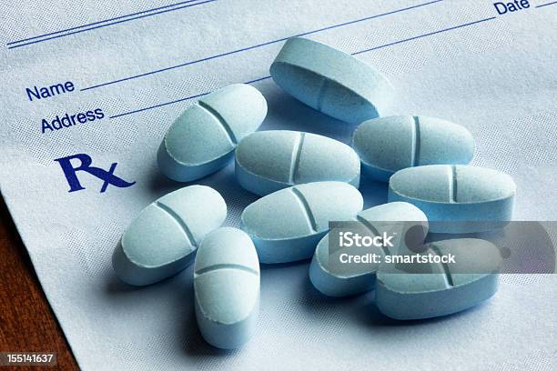 Hydrocodone With Acetaminophen Tablets On A Prescription Form Stock Photo - Download Image Now