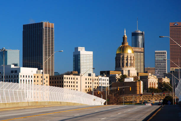 Atlanta GA SUA February 28 A highway leads traffic directly into downtown Atlanta skyline and the golden dome of the Georgia State Capitol