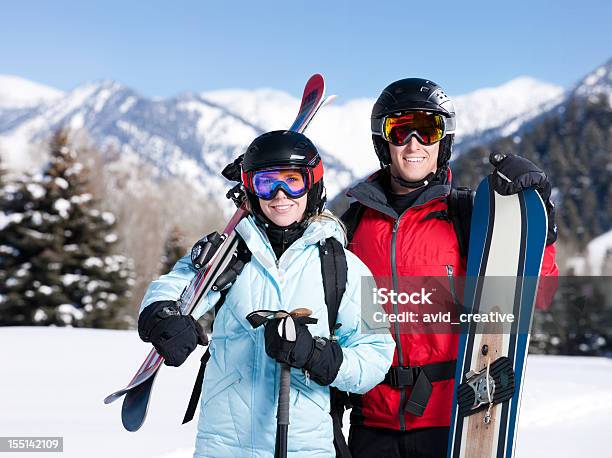 Skier Couple Portrait Stock Photo - Download Image Now - 20-24 Years, 20-29 Years, 25-29 Years