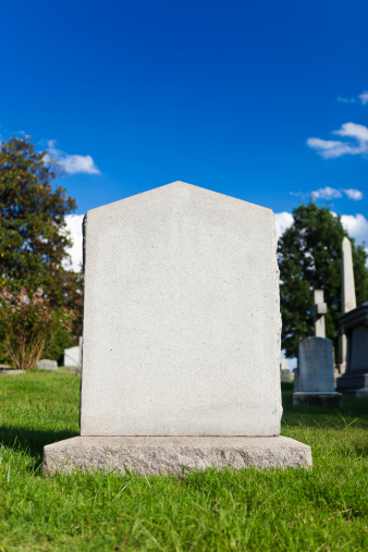 A Blank Tombstone On A Sunny Day