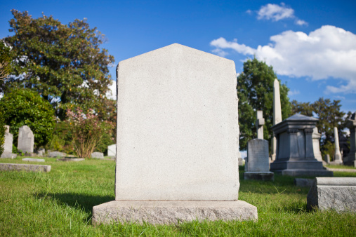 A Blank Tombstone On A Sunny Day