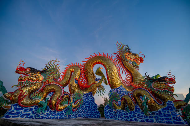 The beautifully detailed golden dancing dragon built in Suan Sawan, or Paradise Park in Nakhon Sawan, Thailand