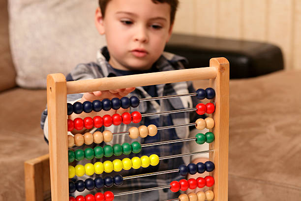 Boy with abacus stock photo