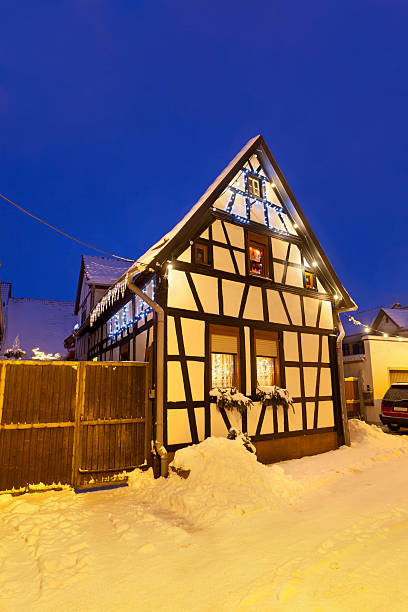 istock Little Christmassy House At Night 155142396