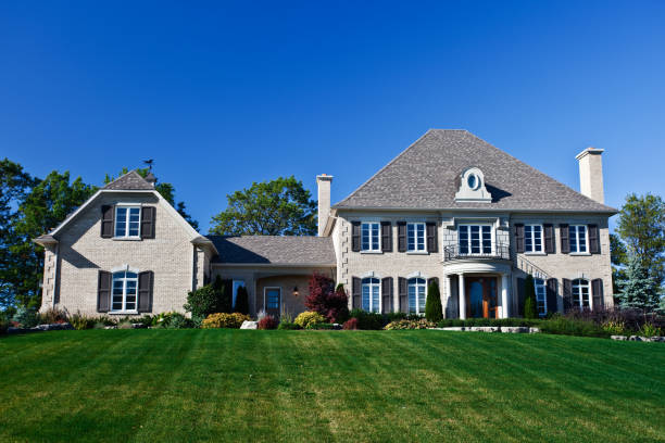 istock An ordinary estate homes against a blue sky 155143189