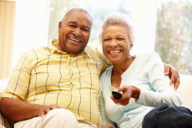 istock Senior African American couple watching TV 155143223