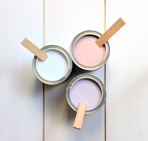 istock cans with brown, white and lavender paint 155143434