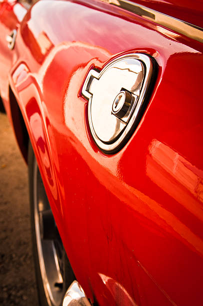 istock petrol cap on a vintage old red car 155143491