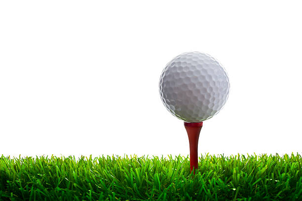 Golf Ball and Tee on grass Golf Ball and Tee on grass. Isolated on white. golf ball photos stock pictures, royalty-free photos & images