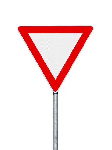 Photo of Road sign. Give way. Isolated on white