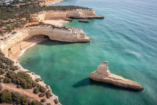 Aerial view of Praia das Fontainhas beach, Morena Beach, Pontal Beach and Yellow Submarine rock in South Algarve, Lagoa municipality