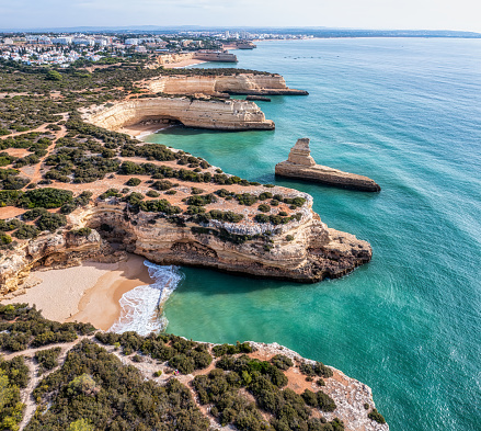 Aerial view of Praia das Fontainhas beach, Morena Beach, Pontal Beach and Yellow Submarine rock in South Algarve, Lagoa municipality