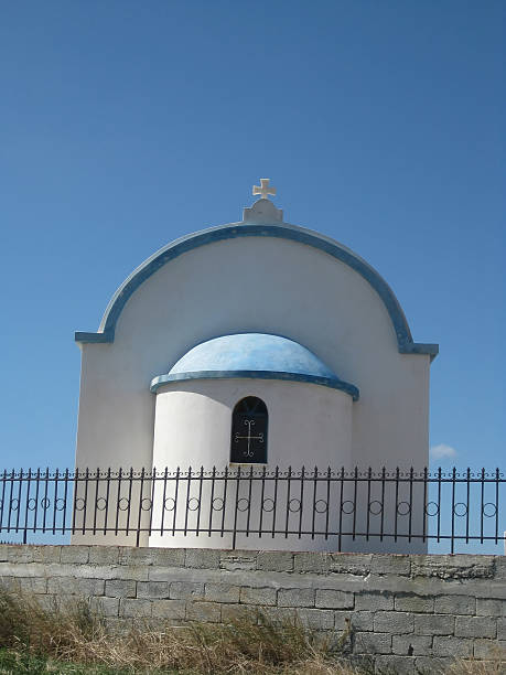 Greek Orthodox Church Dome and Bell Tower with Cross on Top in Samos, Greece