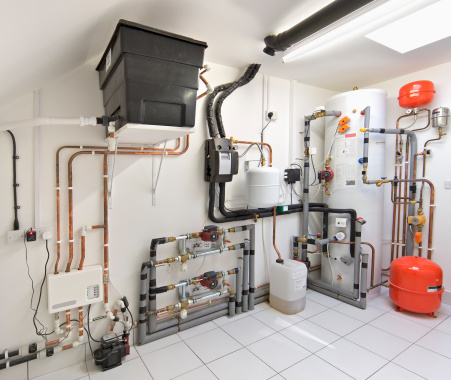 an elaborate and immaculately installed central heating control system in an expensive new house. This system represents an advanced energy efficient heating installation.