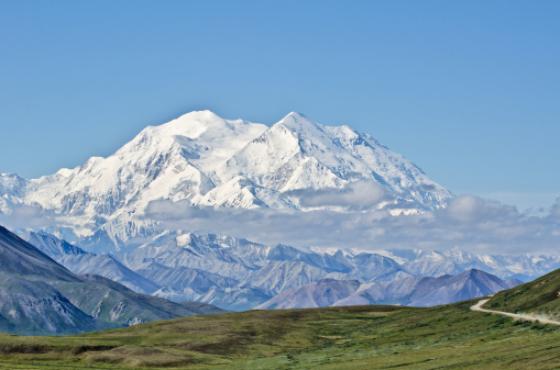 View of Mount McKinley in Denali National Park, Alaska, with Park Road in the foreground leading to it