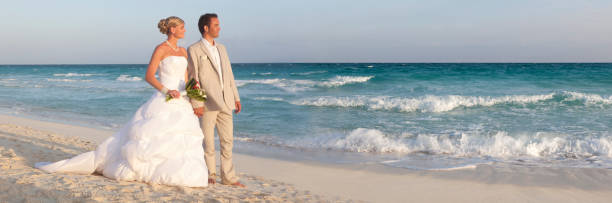 Bride And Groom On Caribbean Beach stock photo