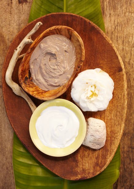 Spa still life with organic mud mask in a bowl