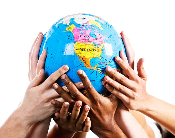 istock Caring hands cradle a world globe showing Northern Hemisphere 155144976