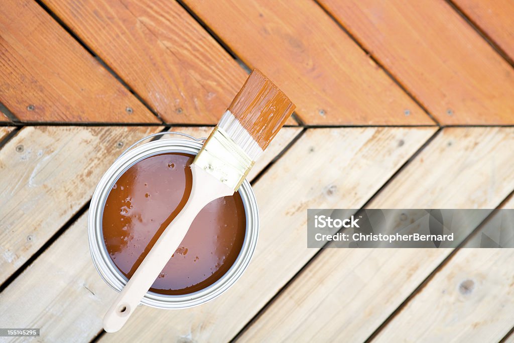 Staining hardwood patio deck  Wood - Material Stock Photo